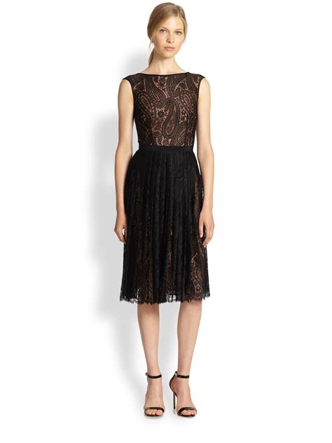 michael kors gold wrap dress|Michael Kors black pleated dress.